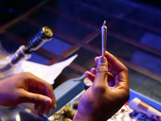 man holding a joint