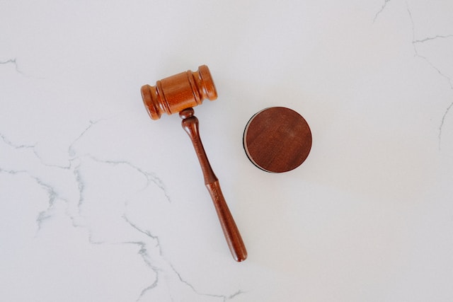 brown gavel on white background