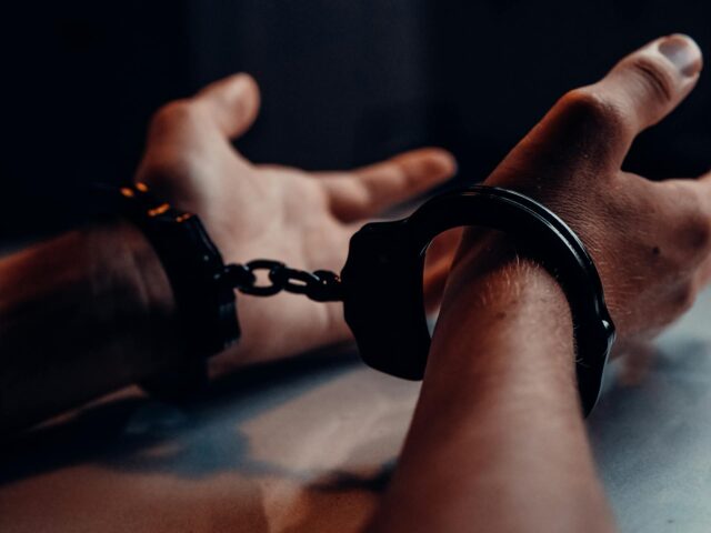 hands in handcuffs