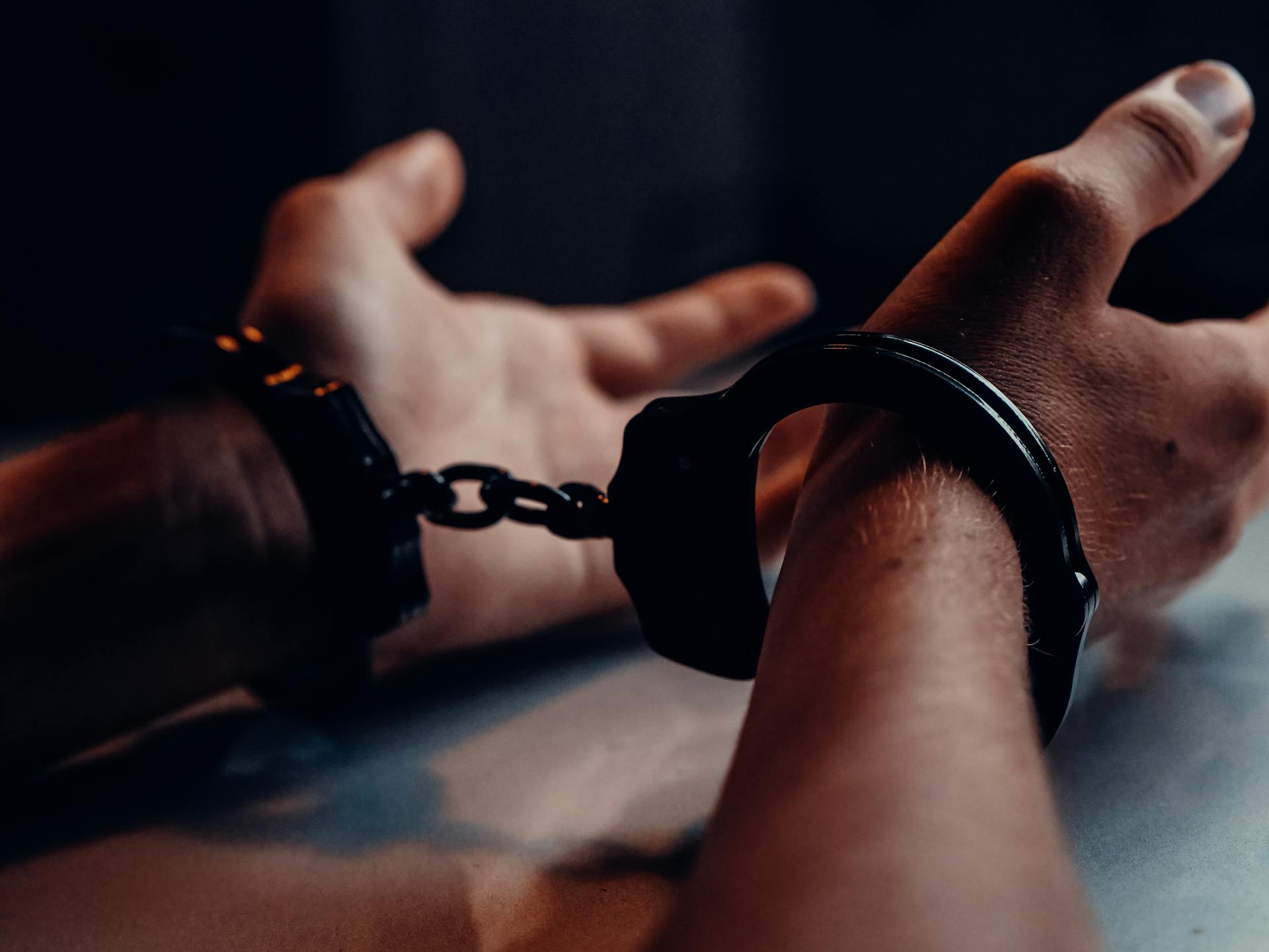 hands in handcuffs